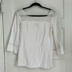 Cute blouse zipper on side. Crocheted details